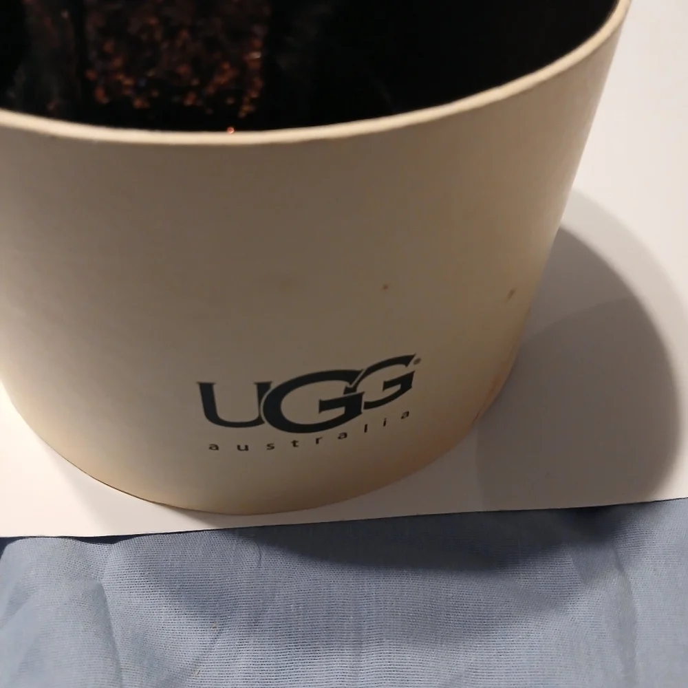 UGG  Youth Girls Black With Purple Sequin Earmuffs.